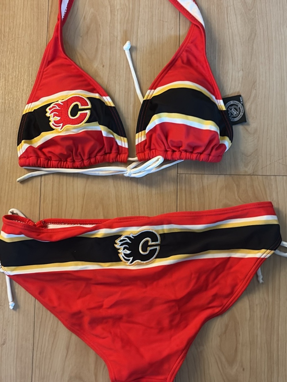 Rare woman’s Calgary Flames Red & Black Two-Piece Swim Set large
